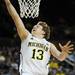 Michigan senior Matt Vogrich makes an easy layup during the first half of an NIT Season Tip-Off game at Crisler Center on Tuesday. Melanie Maxwell I AnnArbor.com